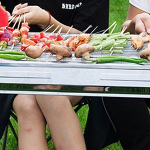Outdoor portable barbecue grill